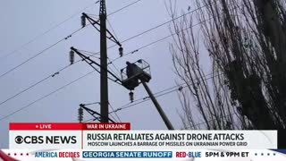Russia blames Ukraine for military base drone strikes, responds with air assault