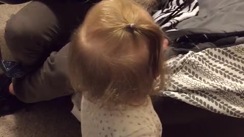 Baby Avery dances to Daddy strumming the guitar