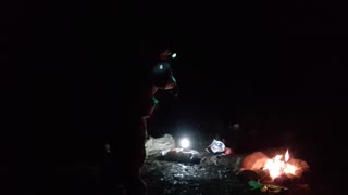 By a campfire. Riverside wildcamping