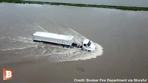HAMMER DOWN! Semi-Truck PLOWS THROUGH Floodwaters in Booker, TX