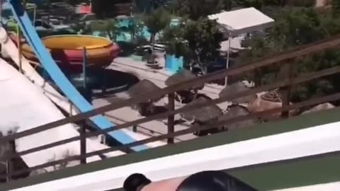 Fat Man Playing Water Slide