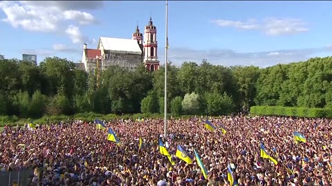 NATO host raises Ukrainian flag sent from frontline