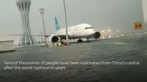 China_ Beijing airport floods after Typhoon Doksuri hits capital
