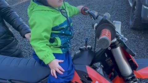 Adventurous toddler already knows he wants to ride a dirt bike