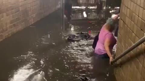 People are swimming in the subway in New York City.