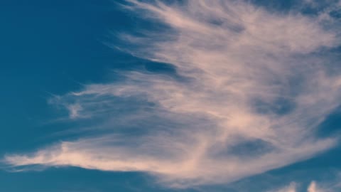 Clouds flying in a blue sky