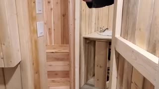 Custom built in home sauna in a small space.