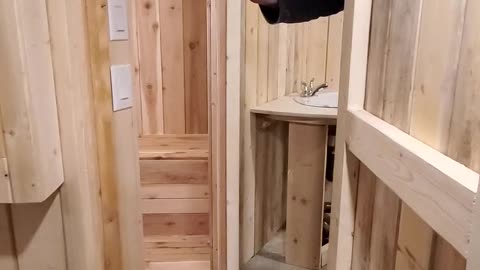 Custom built in home sauna in a small space.