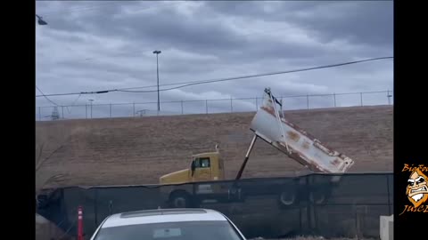 Dump Truck hits power lines