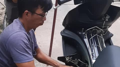Removing a Snake from a Moped