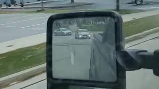 Truck Equipped with Train Horn Makes Car Stop at Tracks