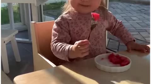 Alara preparing her snack in her little kitchen!🍉