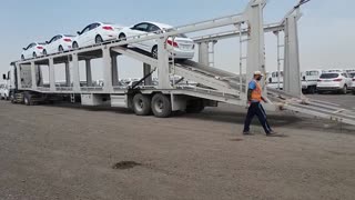 Car carrier off loading