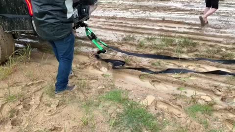 Tough Truck Pulls Semi through Deep Mud