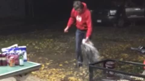 Nsfw guy in red sweatshirt hits beer over his head and chugs it, gets in eye