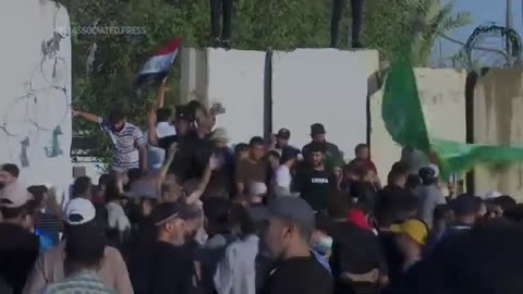 Protesters storm parliament building in Baghdad