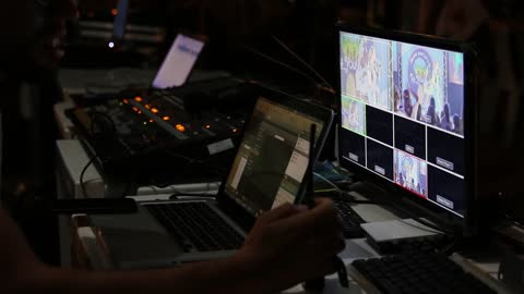 video close up of gadgets and control and panels used by technical people in a control room