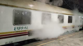 Steam coming out of a train in Tehran Railway Station