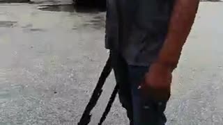 Man Protects Store During Hurricane Harvey