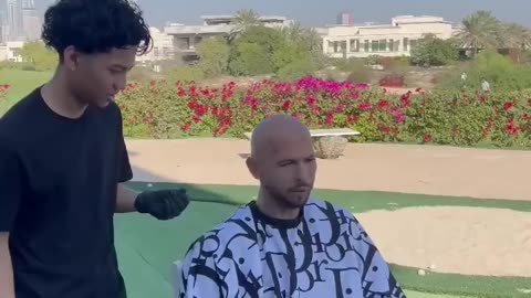 The top g gets a haircut🪙🪙#viral video