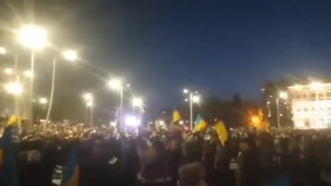 Ukraine citizens in the Donetsk wave their flag and sing the national anthem before the Russia war