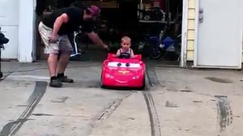 3 year old drifts in his heavy power toy wheels!