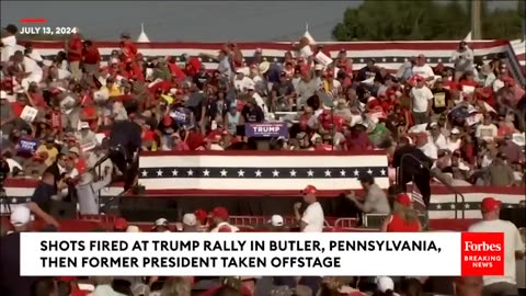 BREAKING_NEWS__Shots_Fired_At_Trump_Rally,_Former_President_Pumps_Fist_As_He_s_Rushed_Off_Stage(480p