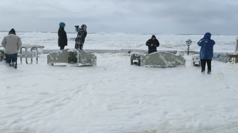 Foam Sneaker Wave Soaks Onlookers at Oregon Coast