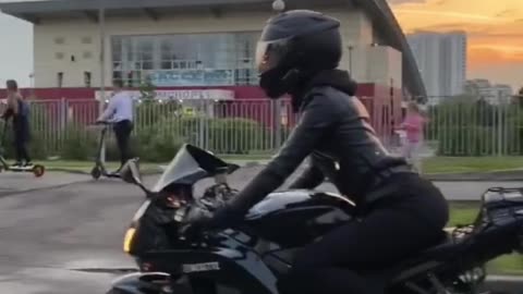 girl on black bike