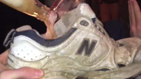 drinking out of a shoe