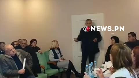 A Ukrainian village councillor set off hand grenades at a meeting