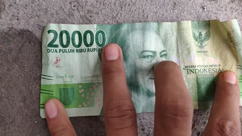 here he is ! Indonesian currency rupiah