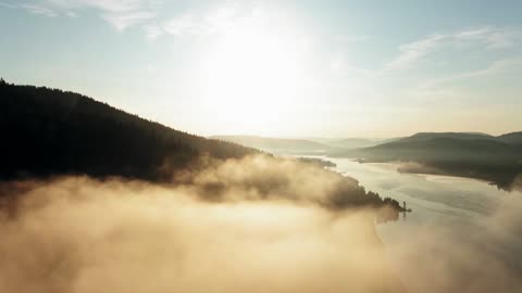 Relieve stress：Drone footage of dense fog on mountain forest