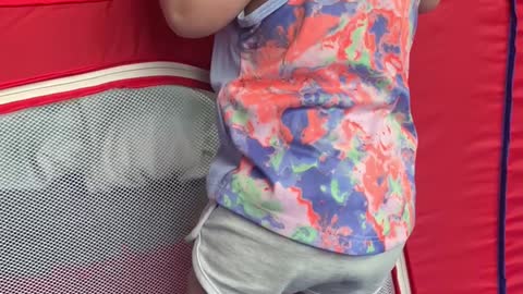 Incredible 9 month old baby girl does a pull up and chin hold