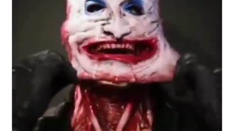 Removable Clown mask reveals skull makeup