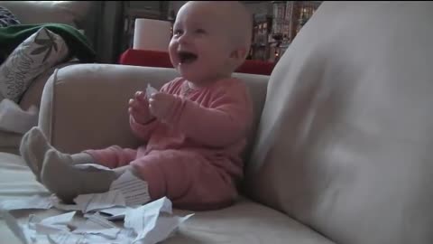 Baby Laughing while Ripping Paper