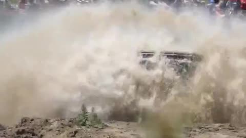 MUD Mega Trucks Jumping at Mud Bog - 4X4 Mud Off-Roading