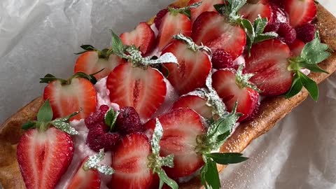 Person Slicing a Strawberry Pei ❤😋