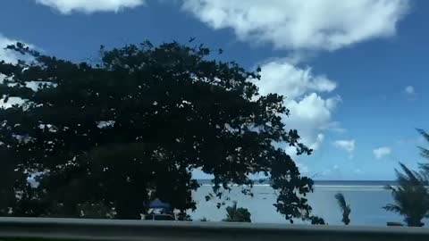 Relaxed drive in red Mustang in Guam