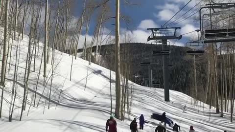 Collab copyright protection - girl hanging off ski lift falls off