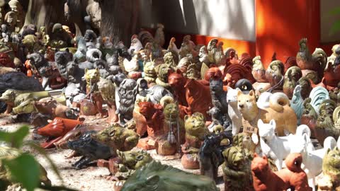 Awashima shrine with thousands of dolls