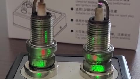 Double-hole spark plug detector