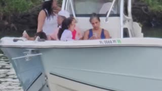 Blue Crew Lady at Black Point Boat Ramp vertical