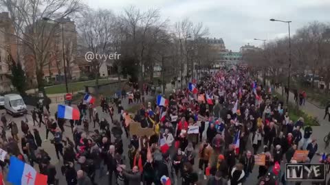 Large protests against vaccine passports in Paris.