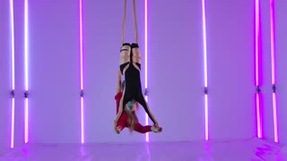 TWO TALENTED GIRLS DOING ACROBATIC SHOW