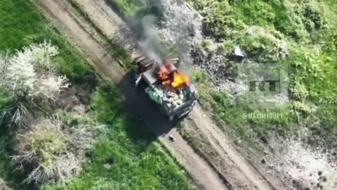 Russian drone drops on Ukrainian soldiers, vehicle and fortification