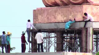 Installing Huge Buddist monk statue in Thailand