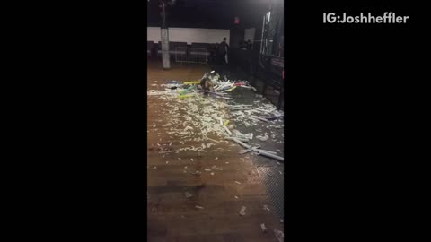 Girl sliding into a pile of trash