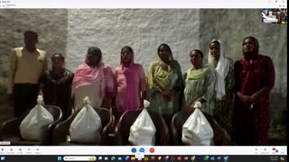 Passing Out Groceries to Widows in India