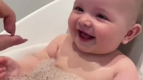 cute chubby baby enjoy with her daddy